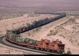A Westbound Military Special Struggles Up The Grade Between Ludlow And Lavic Photo By Steve Schmollinger Train Vintage Train Train Tracks