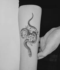 Badass And Bold Snake Tattoo Ideas For Women Cocopipi Snake Tattoo Design Snake Tattoo Ideas Snake Tattoo For Women