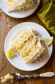 Lemon Coconut Cake With Deliciously Moist Coconut Cake Layers Homemade Lemon Curd Toasted Coconut And C Lemon And Coconut Cake Lemon Coconut Toasted Coconut