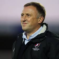 Former Cheltenham Town player Mark Yates has returned to Kidderminster  Harriers as manager