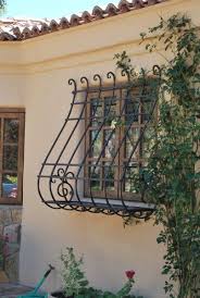 Remodelaholic 25 Inspiring Outdoor Window Treatments Traditional Exterior Iron Window Grill Window Grill