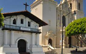 The nearby basilica was finished in 1918 and overshadows the original adobe mission. San Francisco De Asis Mission California Missions Resource Center