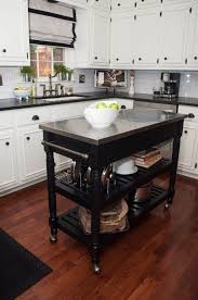 Yaheetech kitchen cart with stainless steel top, kitchen island on wheels with drawer and cabinet, open shelves and spice rack towel rack, white visit the yaheetech store 4.6 out of 5 stars 174 ratings 60 Types Of Small Kitchen Islands Kitchen Remodel Small Kitchen Design Small Portable Kitchen Island