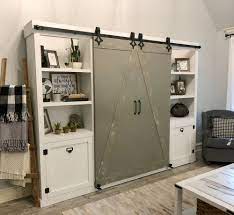 If you can resist the farmhouse style of the humblenest farmers market rustic barn tv stand then you're stronger than us here. Diy Barn Door Media Cabinet Free Plan Shanty 2 Chic