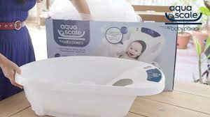 This clever baby bath allows you to check your baby's weight and keep an eye on the temperature of the water while you're washing them. Aquascale Baby Patent