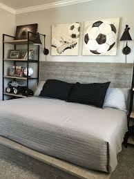 Industrial Style Boy Soccer Themed Bedroom Diy Handmade Wood Bed Shelves Photos Frames And Wi Soccer Themed Bedroom Industrial Bedroom Design Bedroom Themes