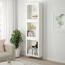 Besta Storage Combination W Glass Doors White Sindvik Stallarp White Clear Glass 23 5 8x8 5 8x79 1 2 Ikea In 2020 Glass Door High Gloss White Shelves Ikea