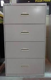 How do you take the drawers out of a steelcase file cabinet? Hon D434l Q 4 Drawer Lateral Metal File Cabinet Office Furniture File Cabinets And More Hon Steelcase Hirsh Staples Tennsco Equip Bid