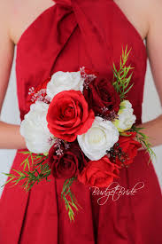 Go for green, red and white color scheme that is traditional for christmas. Davids Bridal Apple Red Wedding Flowers