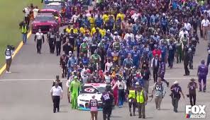 Cup series pit road at sonoma raceway in june of 2018. Nascar Drivers Push Bubba Wallace S Car Down Pit Road In Emotional Show Of Support