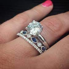 Antique Diamond And Blue Sapphire Wedding Band Looks Amazing Between A Pave Diamond Diamond Wedding Bands Blue Sapphire Wedding Band Pave Diamond Wedding Bands