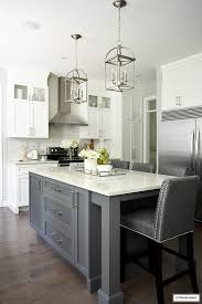 The wall color sure looks tangy and tasteful one homey kitchen with a touch of class and sophistication. White And Grey Kitchen A Hardware Update Citrineliving