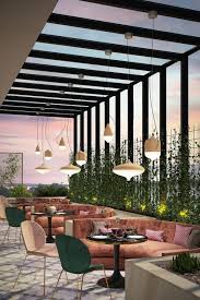 This Restaurant Has Lots Of Natural Light During The Day And Unique Light Fixtures To Bri In 2020 Rooftop Restaurant Design Restaurant Interior Design Restaurant Patio