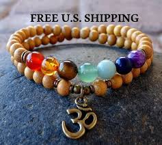 Elephant bracelets for good luck. Seven Chakras Om Wrap Chakra Bracelet Balancing Bracelet Etsy Chakra Bracelet Balance Bracelet Bracelet Designs
