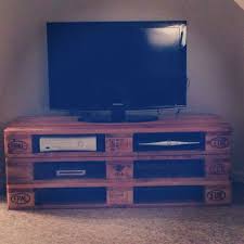 What do you get when you have tons of pallet boards and a bunch of extra stain.bam my rustic tv stand. Tadas Olensevicius Olenseviius Profile Pinterest