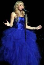 Shakira stuns in purple bathing suit she designed herself. Shakira S Blue Is A Good Thing Blue Dresses Dresses Favorite Dress