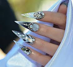 Florals might be the most dated nail art look ever, but the manicurists at creatures of the wind use negative space and unexpected placement for a refreshed take. 50 Sexy And Cool Stiletto Nail Ideas You Have To Try Chic Hostess