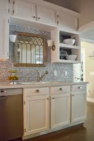 They deliver the look of a farmhouse style. Country Kitchen Wavy Board Between Cabinets