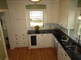 White Cabinets Black Countertops With Green Walls Ohana Construction Inc Black Kitchen Countertops Green Kitchen Walls Black Countertops