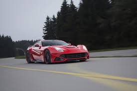 The car is featured in a rosso scuderia exterior over a crema and rosso interior. Novitec Rosso N Largo Ferrari F12 Berlinetta Widebody Winding Road