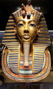 The golden mask of Tutankhamun is one of the most famous artifacts from  ancient Egypt. It was found in the pharaoh's tomb and is made of solid  gold. The mask is beautifully