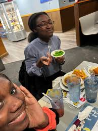 Youth serve at Bobs with huge smiles