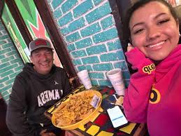 Bella had her final day of classes at Texas Tech so I took her out to lunch  at Chimy's for their awesome chicken nachos. The parking lot was packed.  There was a