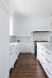 Honed marble has a dull surface which helps to hide some scratches and etching. Honed Marble Staggered Backsplash Tiles Transitional Kitchen
