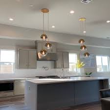 A chandelier is a key opportunity to make a big design statement. Sculptural Glass 3 Light Globe Chandelier Metallic Ombre Globe Chandelier Globe Lights Home Lighting