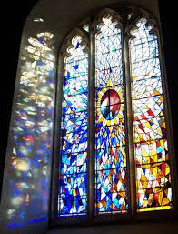 Put simply, stained glass is a light painting, an illuminated wall decoration. Light Shining Through The St Idloes Stained Glass Window
