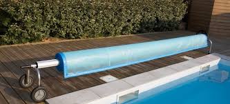 Above ground pool cover above ground pool decks in ground pools homemade pools pool cover roller piscina diy solar cover pool hacks pool care. How To Install A Solar Pool Cover Doityourself Com