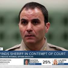 Sheriff found in contempt in same case that ensnared Arpaio