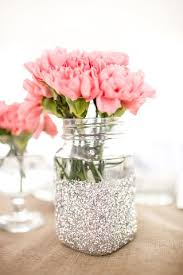 Mason Jar Centerpieces Ideas For Wedding Reception Centerpieces Using Mason Jars With Images Glitter Centerpieces Glitter Mason Jars Apple Orchard Wedding