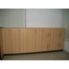 A full height corner cupboard would have dominated the room and the lamp table that was there looked lost. Office Storage Units Medium Height Storage Cabinets Manufacturer From New Delhi