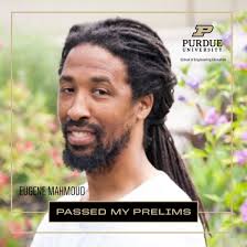 Sobhit Singh (pictured center), assistant professor of mechanical  engineering, was recognized at the University of Rochester's Commencement  today with the G. Graydon Curtis '58 and Jane W. Curtis Award for  Non-Tenured Faculty