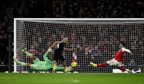 Bryan Mbuemo of Manchester United celebrates after scoring against Arsenal during the Premier League 2025-26 match at Emirates Stadium