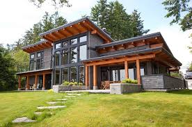 Dealing with a lot that slopes can make it tricky to build, but with the right house plan love entertaining? Modern Cottage Basement House Plans Architecture House House Exterior