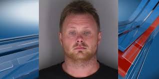 One arrested following string of vehicle burglaries at Topeka hotel