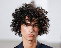 Half updos are a favorite for a reason: The Top Curly Hairstyles From The Men S Runway