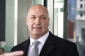 Football great Brian Urlacher's brother pardoned by Trump