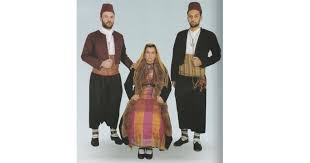 On the islands, the men's traditional costume starts with a white undergarment and is layered with baggy pants, known as vraka, a white shirt, a sleeveless coat, a sash, a jacket and a tasseled cap. Traditional Pontic Greek Costumes