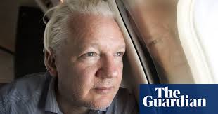 The Guardian: "US lawmakers urge Biden to pardon Assange to send 'clear  message'