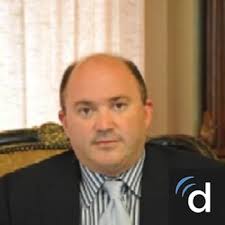 Dr. Dennis R. Holmes, MD