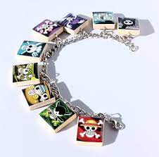 Maybe you would like to learn more about one of these? Amazon Com One Piece Jolly Roger Inspired Scrabble Tile Charm Bracelet Anime Inspired Handmade