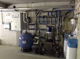 zwembad installatie de wilde zwembaden oosterzele overloopbad met uv lamp en cyclonefilter op bufferpomp zwembad zwembaden lampen