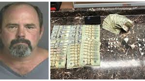 Man arrested after investigators take cocaine, meth, nearly $2,000 in cash  from home