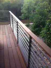 A wood deck rail can be very simple or more elaborate. 13 Horizontal Deck Railing Ideas Deck Railings Railing Horizontal Deck Railing