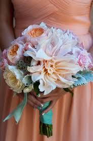 It's raining day here in england. Jeff And Allison Had A Lovely Turquoise And Peach Wedding Wedding Bouquets Peach Wedding Bridal Flowers