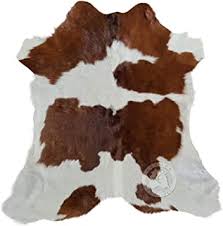 Welcome this brown and white calf hide rug in your house too and see how it will add a more rustic atmosphere in your house. Amazon Com Hide Rugs