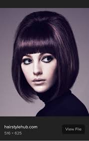 This isn't meant to be a complaint about the show, just a question. Did  anybody in the early 1950s wear their hair long and straight like this girl  in the middle? I